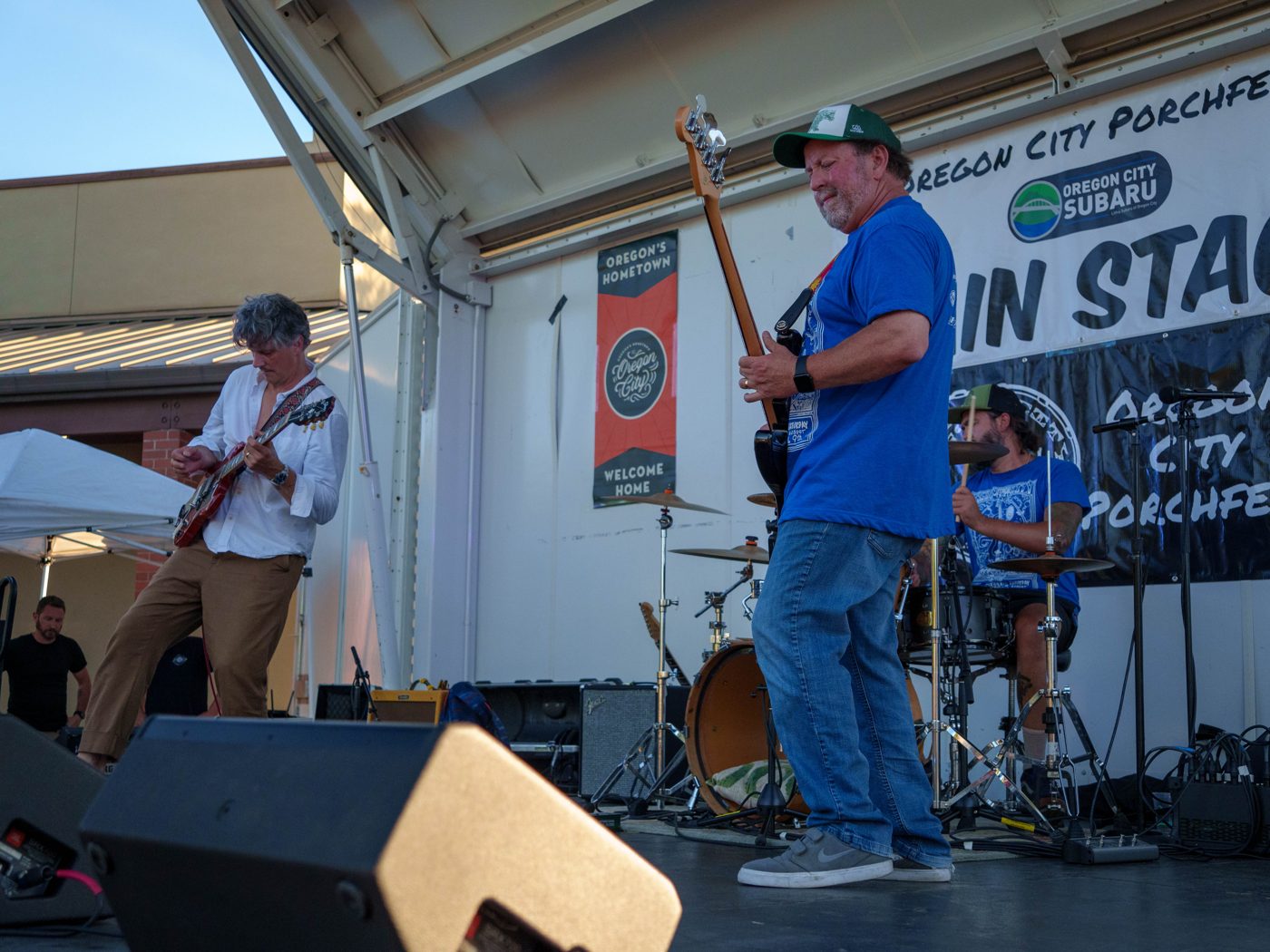A band playing under the Oregon City Porchfest main stage banner
